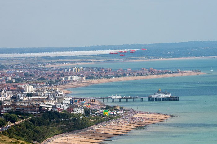 Red Arrows arriving over Eastbourne pier