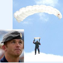 lands on his emergency shute